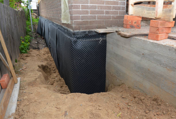 Happy homeowners after waterproofing job in Wickliffe